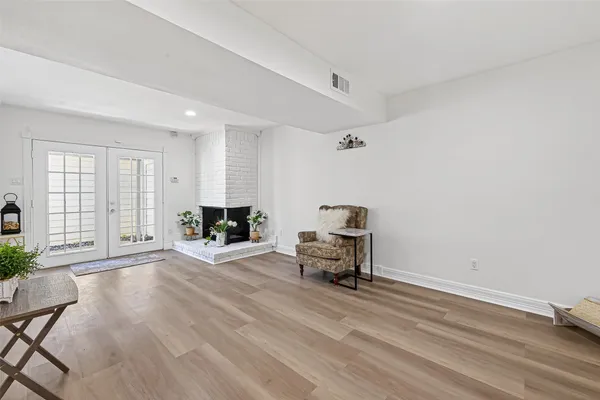 a view of livingroom with furniture wooden floor and window