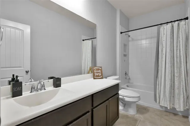 a room with furniture and a chandelier