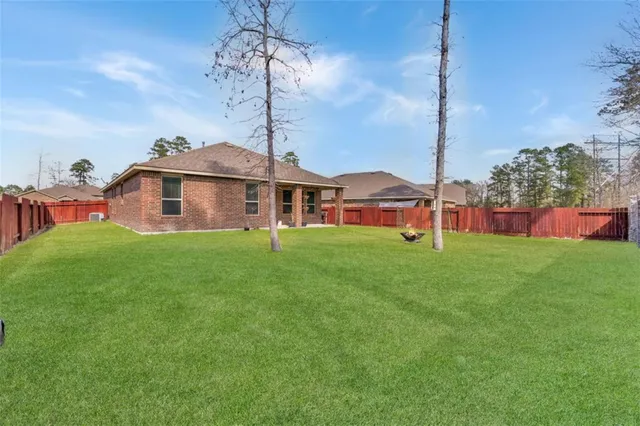 a view of a yard with a slide