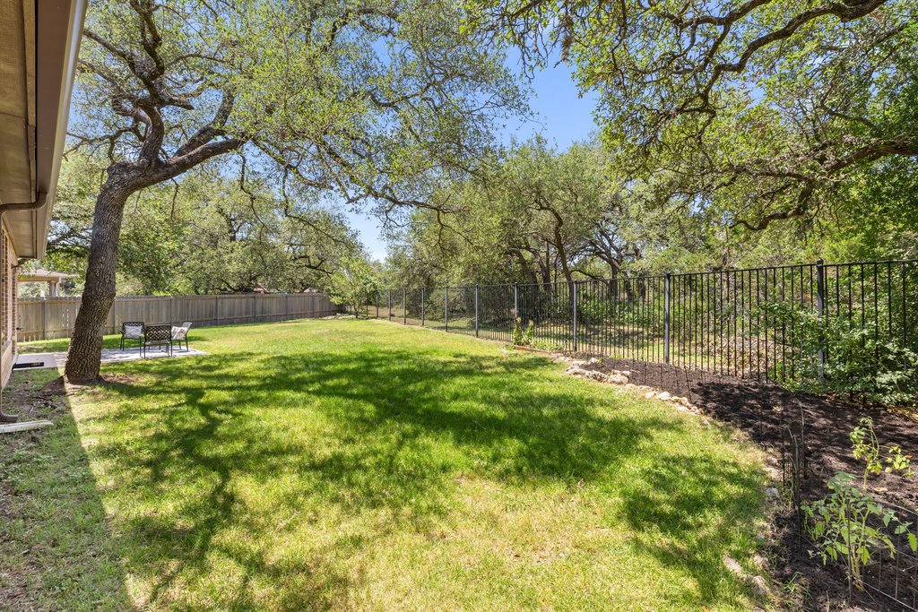 11129 Bastogne Loop Austin, TX 78739 - Photo 28 of 40 11129 Bastogne Lp backs to a peaceful greenbelt and offers beautifully designed single-story living in one of Southwest Austin’s most sought-after communities.