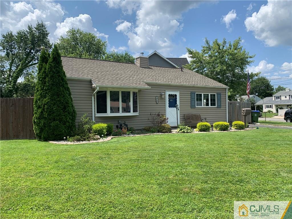 34 Windsor Road Edison, NJ 08817 - Photo 1 of 15 a front view of house with yard and green space
