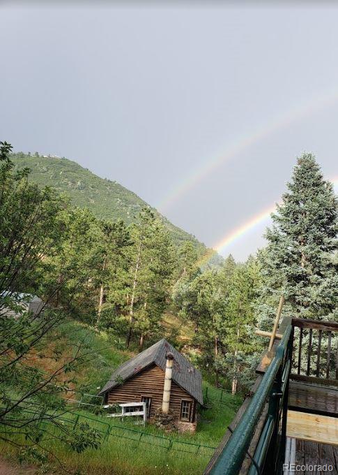 10013 McKinney Road Littleton, CO 80127 - Photo 19 of 25 a view of a forest from a balcony
