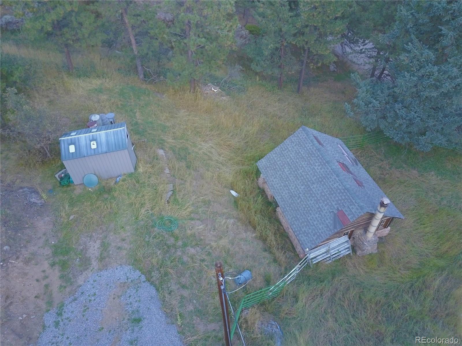 10013 McKinney Road Littleton, CO 80127 - Photo 21 of 25 an aerial view of a house with a yard