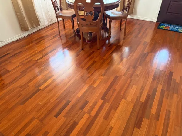 a kitchen with granite countertop a refrigerator stove and sink