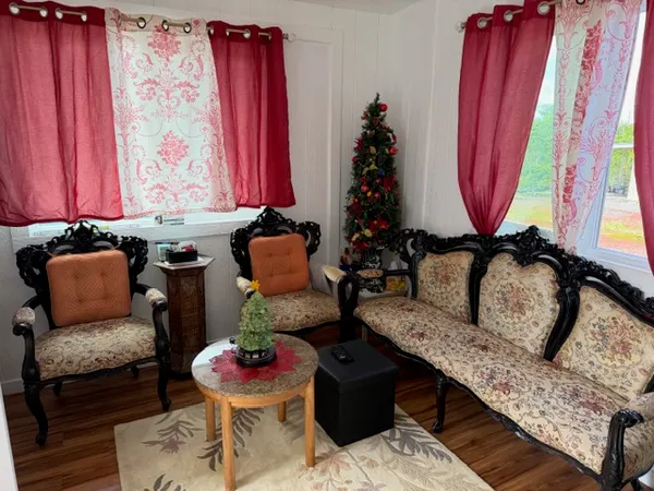 a kitchen with refrigerator a window and counter space