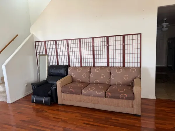 a room with furniture and a window