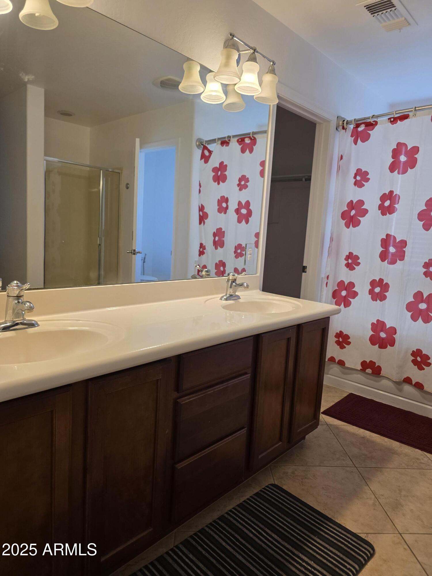 16206 North 22nd Lane Phoenix, AZ 85023 - Photo 14 of 29 a bathroom with a sink mirror and vanity