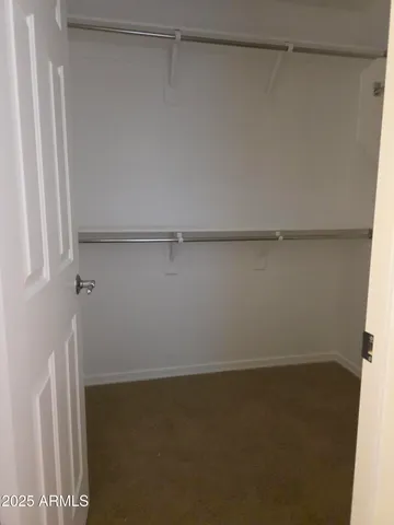 a view of small space with racks on the wall