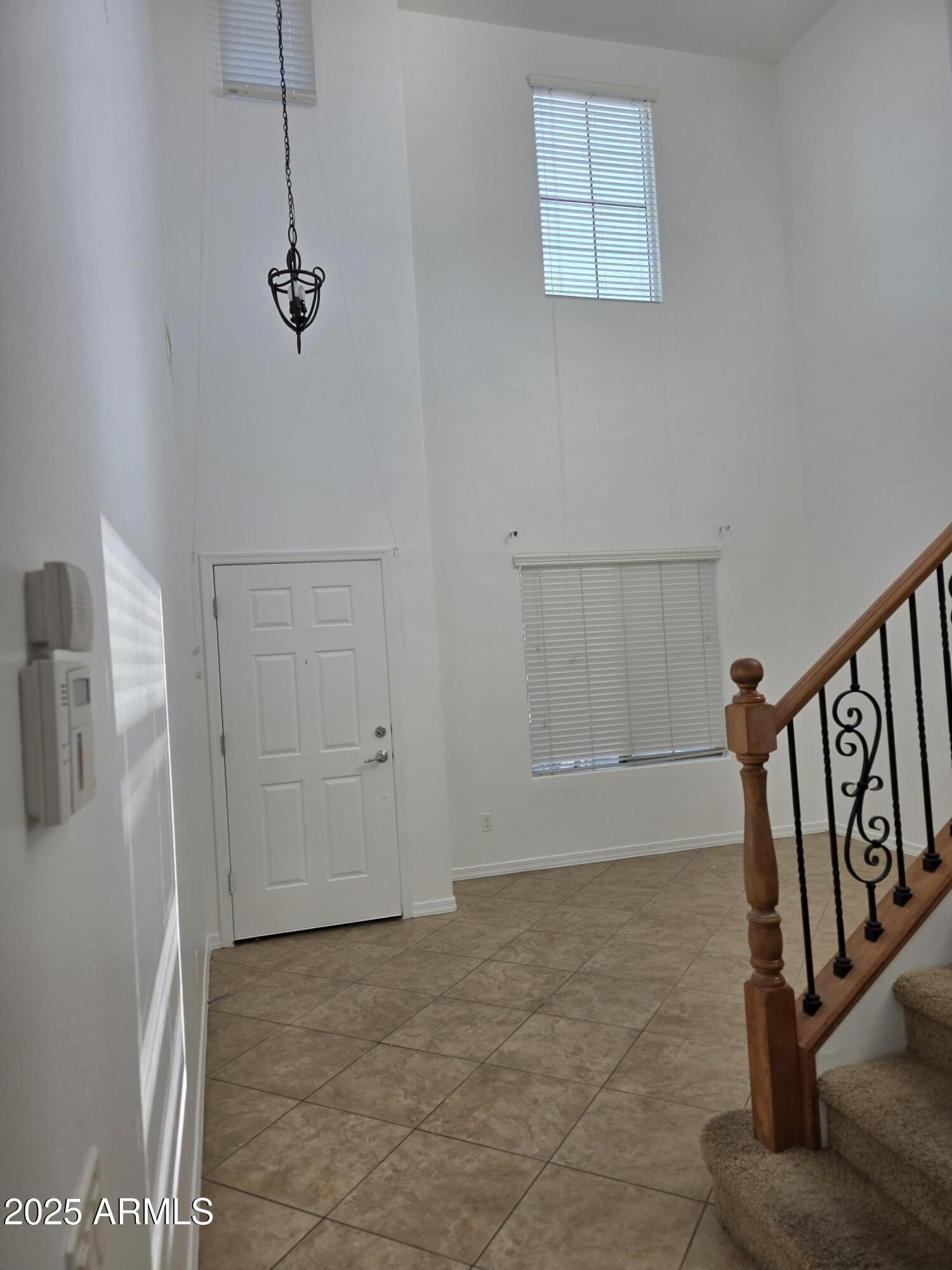 16206 North 22nd Lane Phoenix, AZ 85023 - Photo 2 of 29 a view of an entryway with stairs