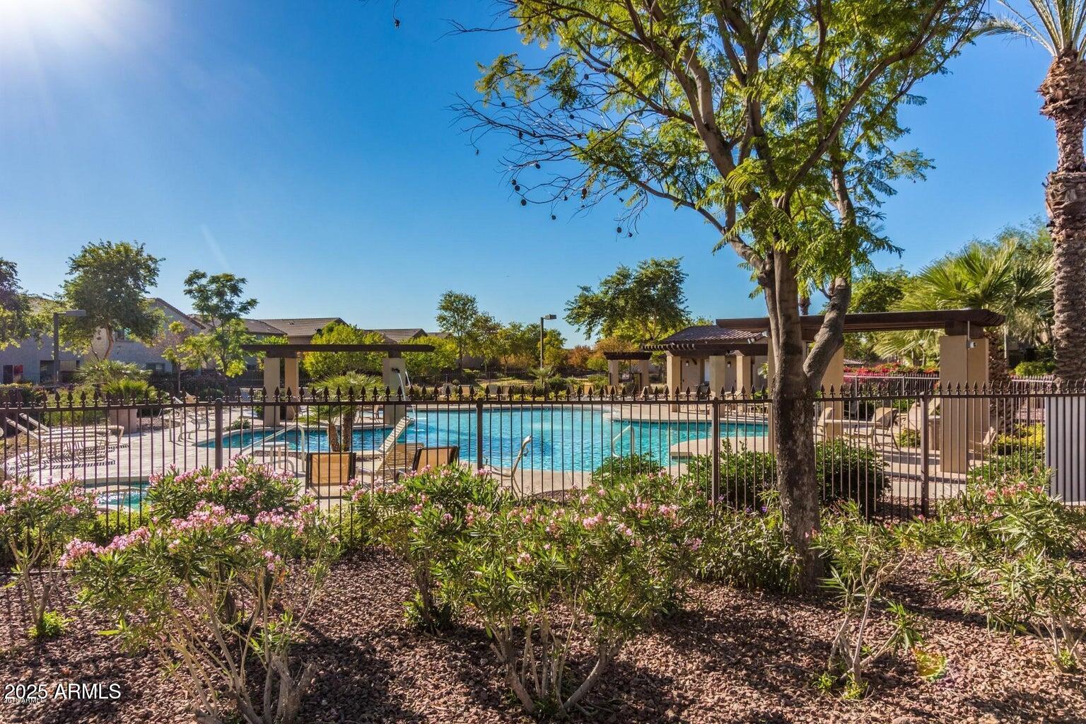 16206 North 22nd Lane Phoenix, AZ 85023 - Photo 28 of 29 a view of a lake with a house in the background