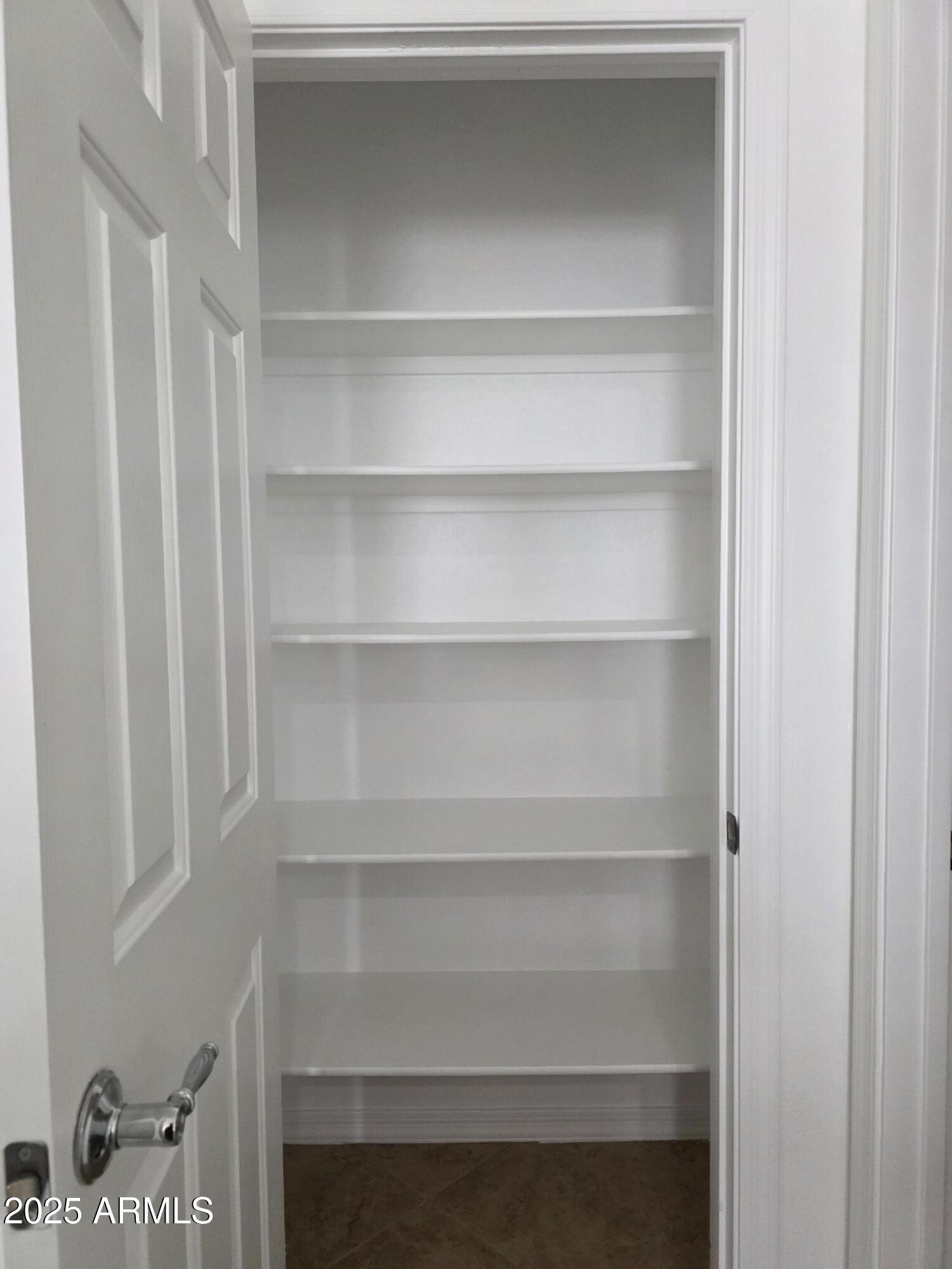 16206 North 22nd Lane Phoenix, AZ 85023 - Photo 10 of 29 a view of walk in closet with empty racks