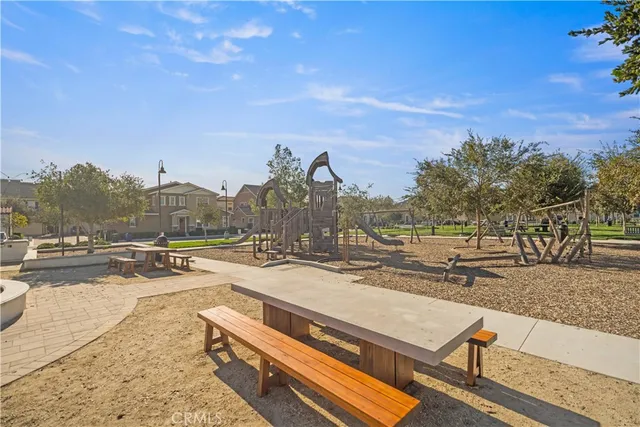 an aerial view of a residential houses with outdoor space