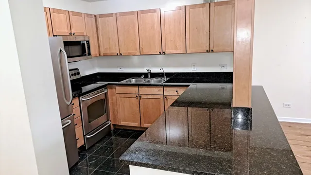 a close view of a stove and a microwave oven