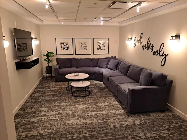 a kitchen with stainless steel appliances a refrigerator sink and cabinets