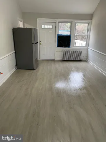 a view of house with a roof deck