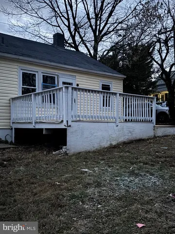 a kitchen with a refrigerator and window