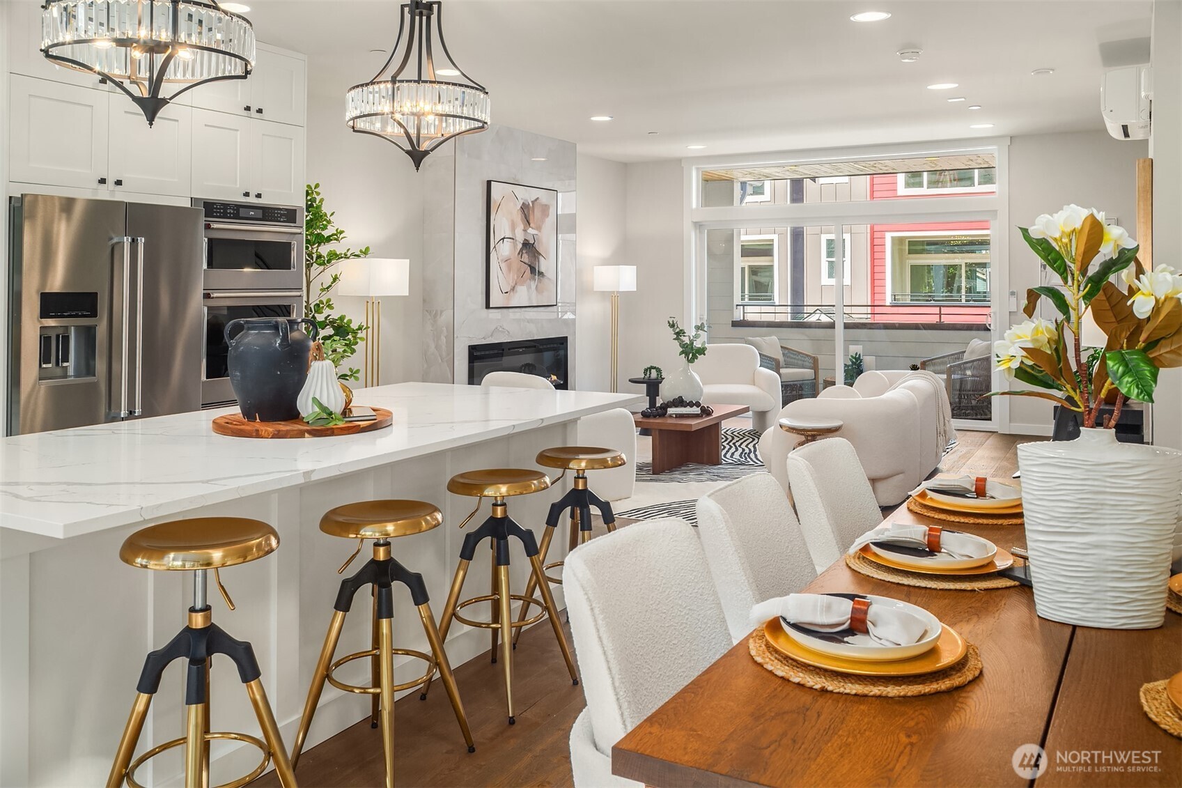 19722 Filbert Drive, Unit 9 Bothell, WA 98012 - Photo 17 of 35 a kitchen with stainless steel appliances granite countertop a dining table and chairs