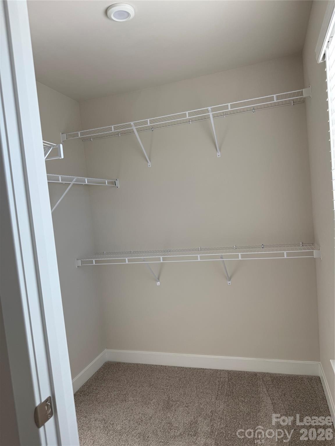 1654 Respect Street Northwest Concord, NC 28027 - Photo 14 of 19 a view of an empty walk in closet