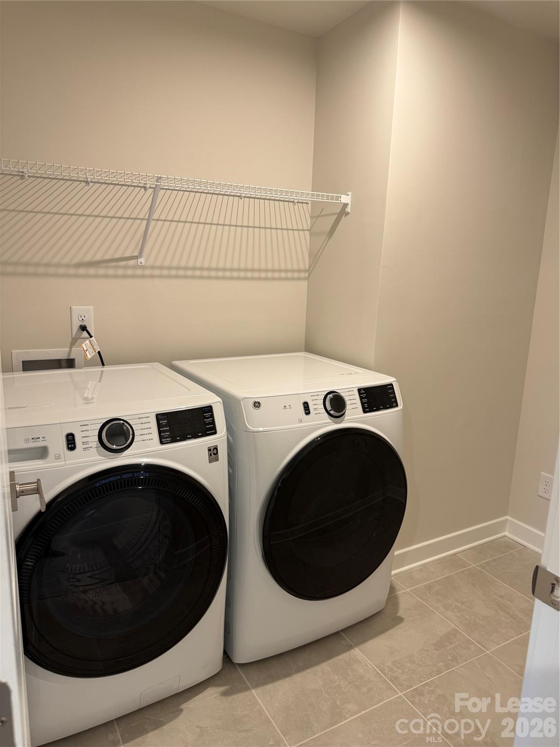 1654 Respect Street Northwest Concord, NC 28027 - Photo 19 of 19 a utility room with dryer and washer