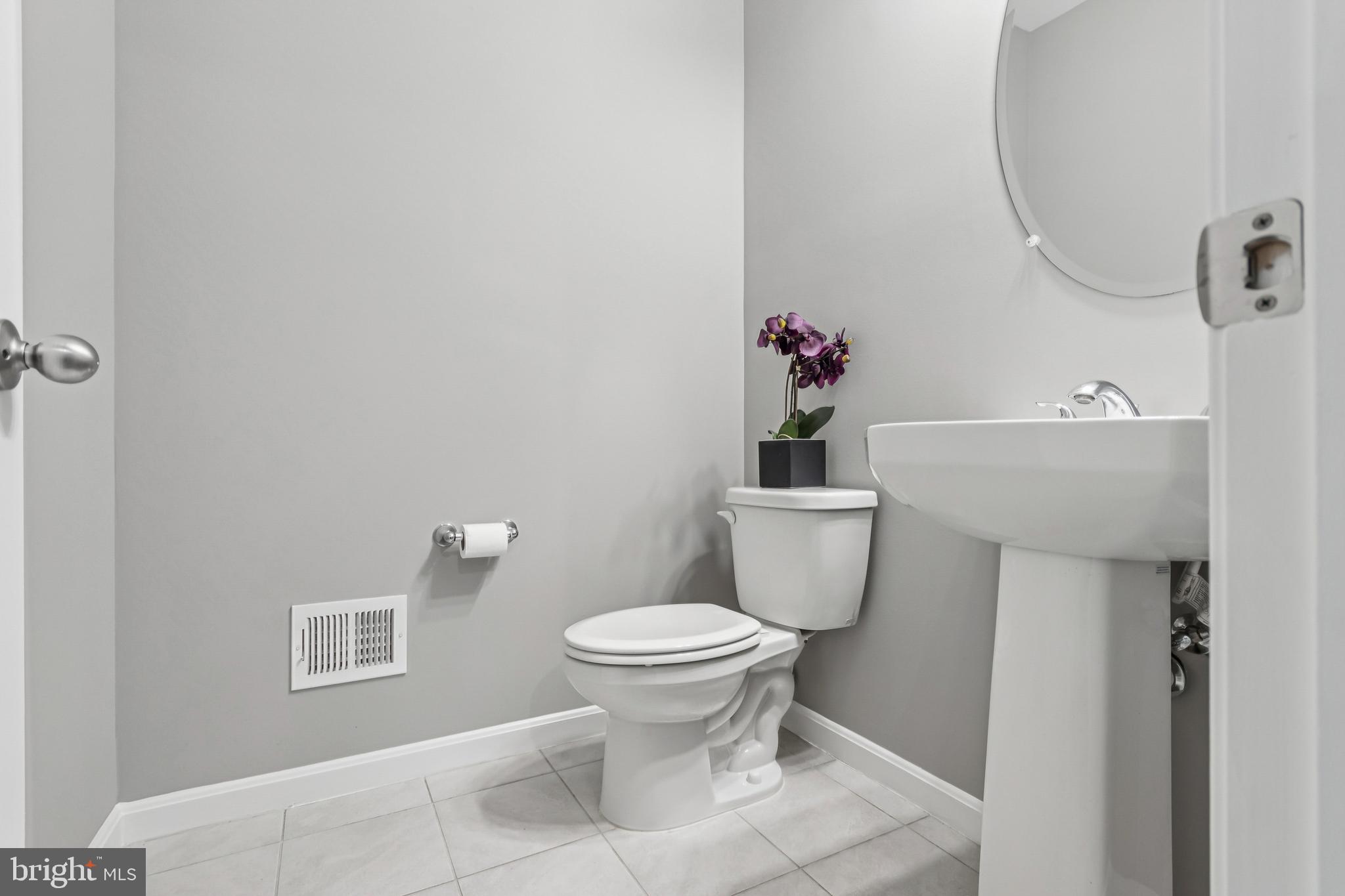 7252 Liberty Court Ruther Glen, VA 22546 - Photo 19 of 45 a bathroom with a sink and a toilet