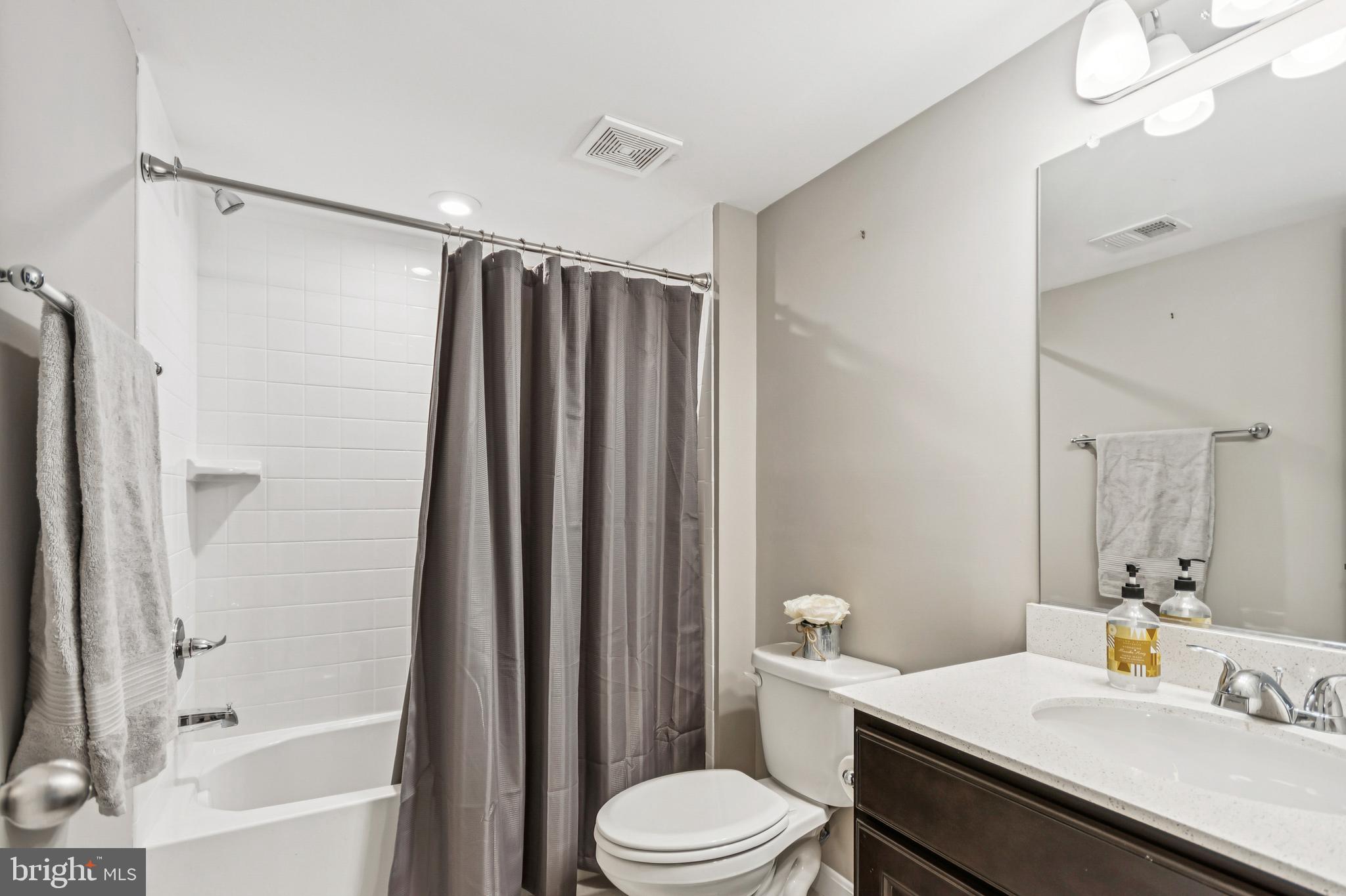 7252 Liberty Court Ruther Glen, VA 22546 - Photo 37 of 45 a bathroom with a sink toilet and shower