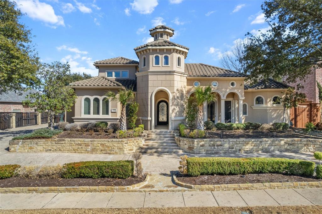 6700 Crown Forest Drive Plano, TX 75024 - Photo 1 of 1 a front view of a house with garden
