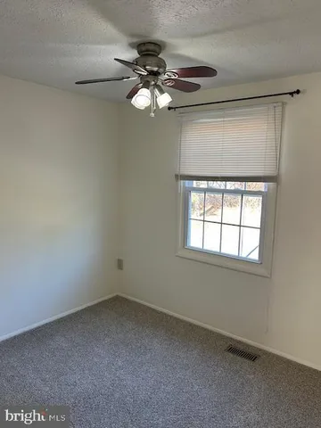 a bathroom with a toilet a sink and bathtub