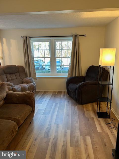 1752 Springfield Lane Frederick, MD 21702 - Photo 2 of 25 a living room with furniture and a window