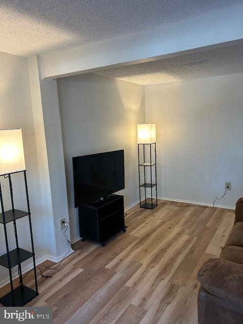 1752 Springfield Lane Frederick, MD 21702 - Photo 3 of 25 a view of a livingroom with furniture and a flat screen tv