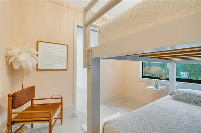 a bedroom with a bed and furniture