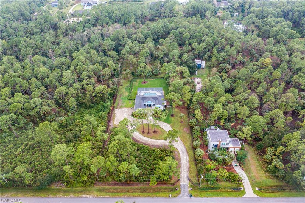 2991 2nd Street Northwest Naples, FL 34120 - Photo 40 of 43 an aerial view of a house with yard