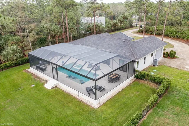 a view of a patio with a yard