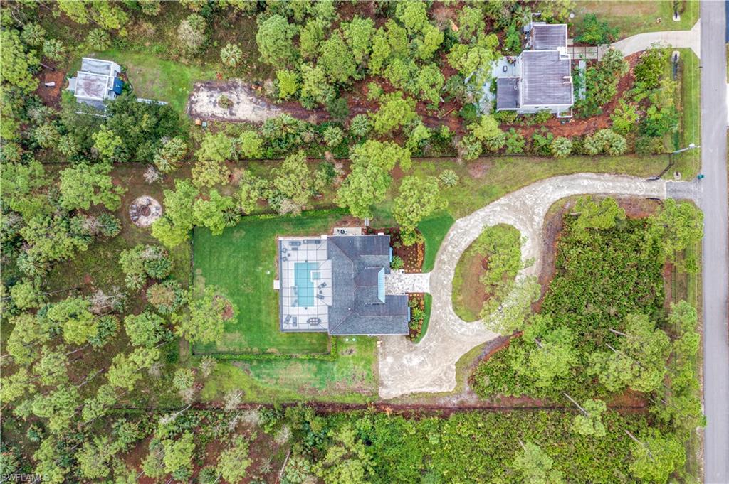 2991 2nd Street Northwest Naples, FL 34120 - Photo 42 of 43 an aerial view of a house with outdoor space and lake view