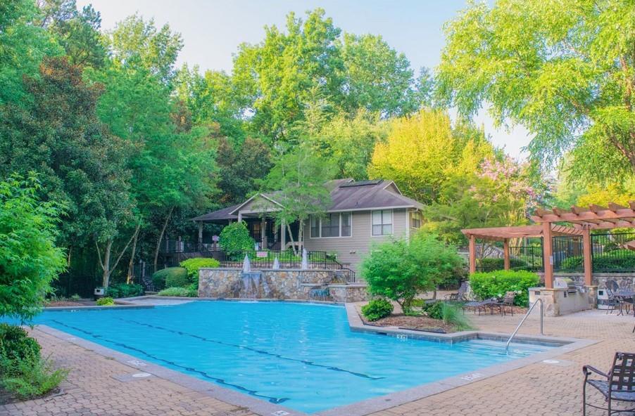 3450 K Jones Mill Road, Unit 218 Norcross, GA 30092 - Photo 22 of 29 a view of a house with backyard and sitting area