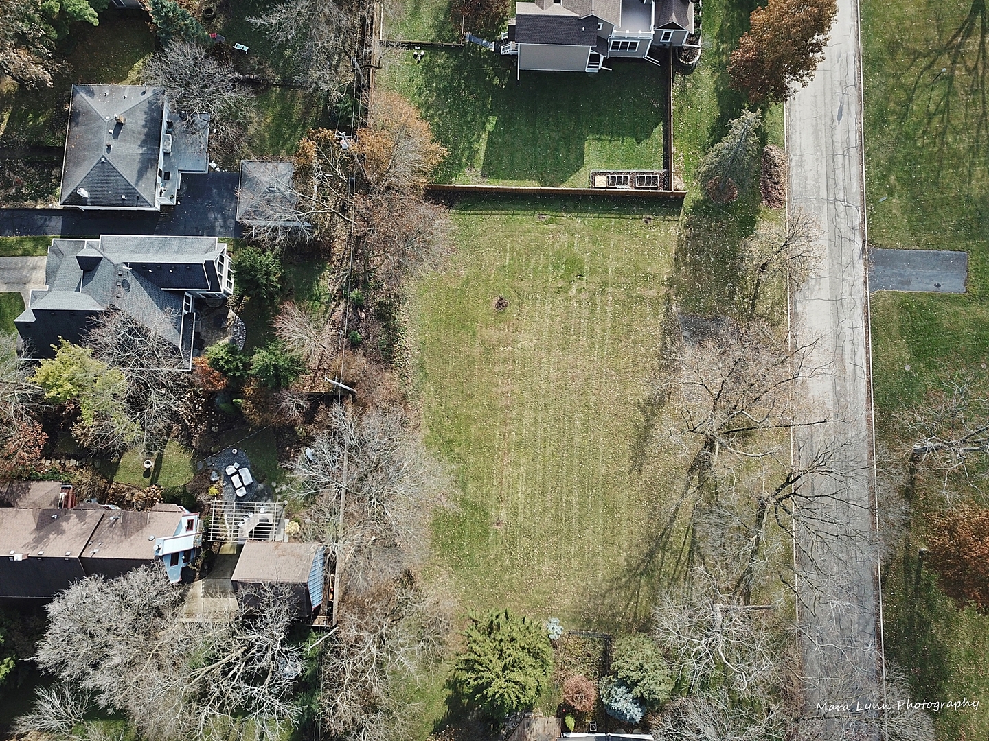 715 Meadows Road Geneva, IL 60134 - Photo 8 of 12 an aerial view of a house with a yard