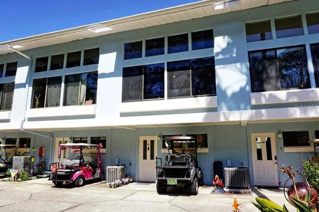 a view of a car park in front of building