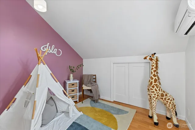a view of a livingroom with furniture and staircase