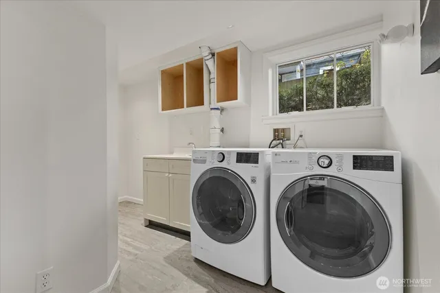 a utility room with dryer and washer