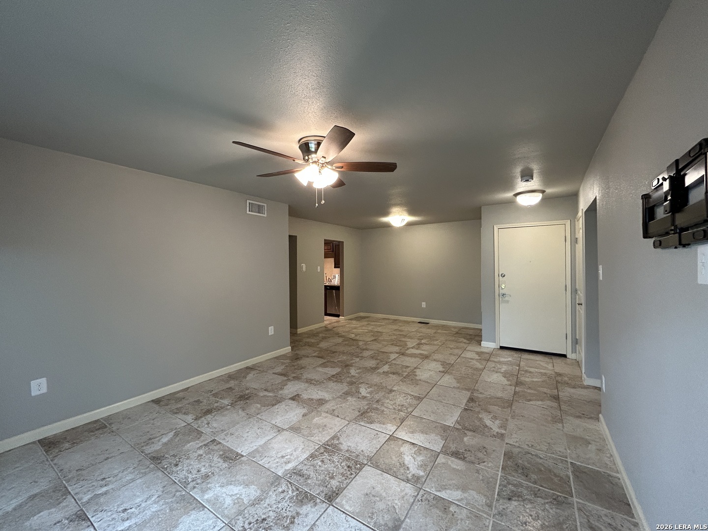 551 Terminal Loop Road, Unit D5 McQueeney, TX 78123 - Photo 6 of 42 a view of a big room with a ceiling fan and bathroom