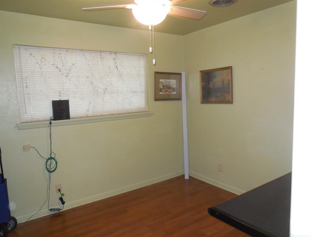 209 Breckenridge Road Ranger, TX 76470 - Photo 14 of 21 a view of small space with wooden floor