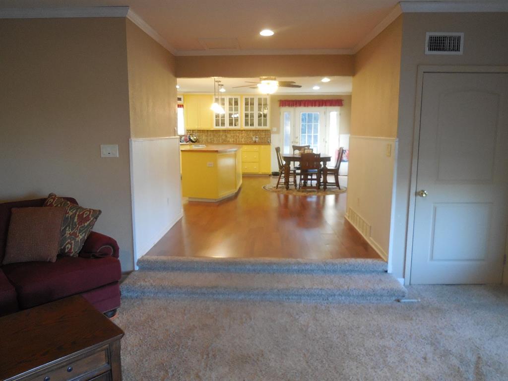 209 Breckenridge Road Ranger, TX 76470 - Photo 20 of 21 a view of a living room and dining room