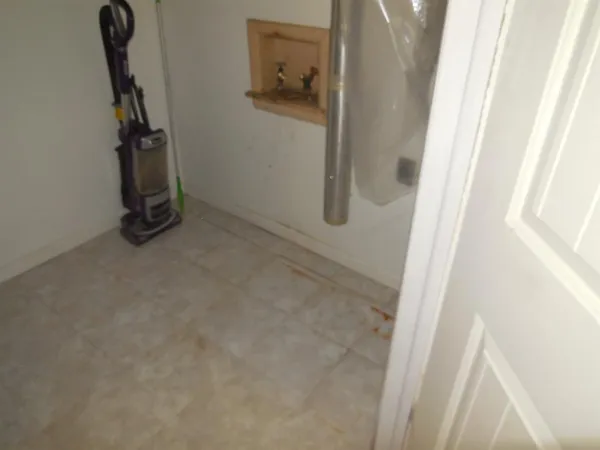 a room with furniture and a wooden floor