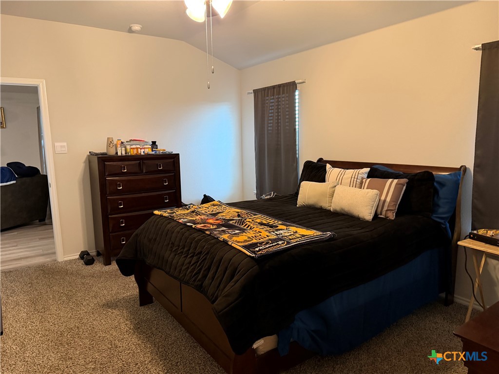 1335 Brookfield Street Temple, TX 76504 - Photo 9 of 15 a bedroom with a bed and a dresser