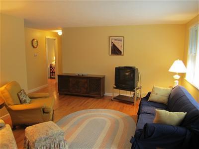 87 Foster Road Brewster, MA 02631 - Photo 7 of 15 a bedroom with a bed and couch