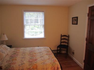 87 Foster Road Brewster, MA 02631 - Photo 8 of 15 a bedroom with a bed and a window