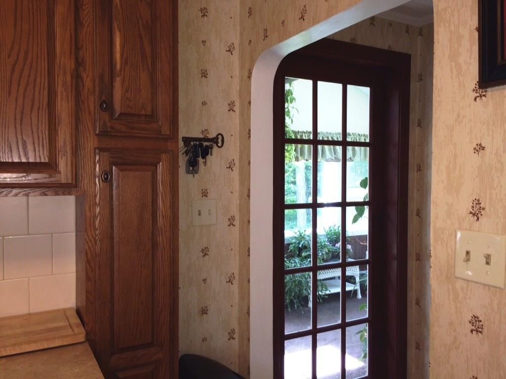 305 Murphy's Corner Road Woolwich, ME 04579 - Photo 7 of 34 A nifty pocket door with glass...
