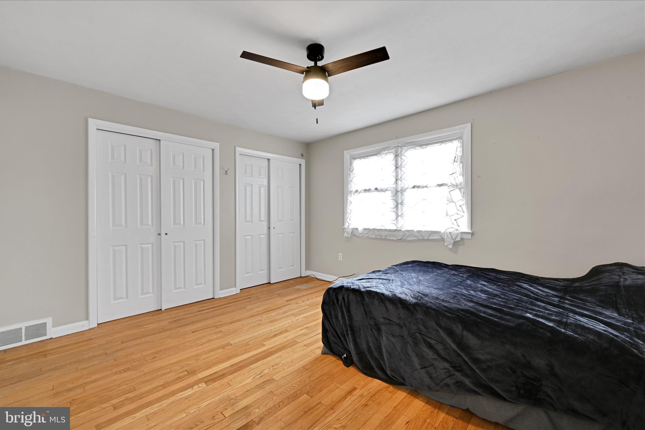 465 Pleasant View Road New Cumberland, PA 17070 - Photo 14 of 31 a bed sitting in a bedroom next to a window