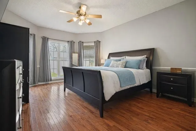 a bathroom with a shower a mirror and a shower