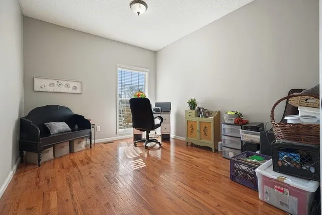 a bathroom with a sink and a large mirror