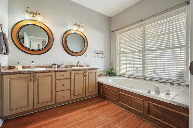 a view of a house with a backyard